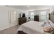 Main bedroom with ensuite bathroom and walk in closet at 8511 Triumph Cir, Wildwood, FL 34785