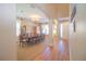 Formal dining room with hardwood floors, chandelier, and large table at 904 Cloverwood Way, Winter Garden, FL 34787