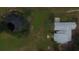 Aerial view of house and pond at 9622 Dr Baker Rd, Groveland, FL 34736