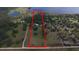 Aerial view of property, including house and pond at 9622 Dr Baker Rd, Groveland, FL 34736