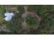 Aerial view of house and surrounding land at 9622 Dr Baker Rd, Groveland, FL 34736