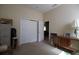 Spacious bedroom with double door closet and vintage furniture at 9622 Dr Baker Rd, Groveland, FL 34736