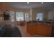 Kitchen with an eat-in area and view of the backyard at 9622 Dr Baker Rd, Groveland, FL 34736