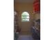 Well-organized storage room with shelving units and ample space at 9622 Dr Baker Rd, Groveland, FL 34736