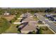 Aerial view of houses in a residential neighborhood at 9800 Pepper Tree Trl, Wildwood, FL 34785