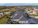 Aerial view of house and community, showcasing a desirable location and neighborhood at 1060 Maynard Path, The Villages, FL 32163