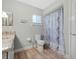 Clean bathroom with granite vanity and updated shower at 10662 Se 174Th Loop, Summerfield, FL 34491