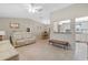 Open concept living area with a view of the kitchen and dining area at 10662 Se 174Th Loop, Summerfield, FL 34491