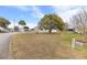 View of a residential street with homes and landscaping at 10662 Se 174Th Loop, Summerfield, FL 34491