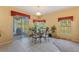 Cozy dining area with a round table and chairs, near the living room at 1070 Bentry Ct, Clermont, FL 34711