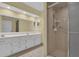 Main bathroom with shower and double vanity at 11631 Sw 82Nd Ter, Ocala, FL 34481