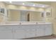 Bathroom boasts dual sinks and a large vanity with ample storage at 11631 Sw 82Nd Ter, Ocala, FL 34481