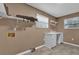 Laundry room with built in cabinets and shelving at 11631 Sw 82Nd Ter, Ocala, FL 34481