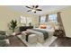 Spacious main bedroom with wood-look floors and plenty of natural light at 11631 Sw 82Nd Ter, Ocala, FL 34481