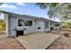 Back patio with grill, adjacent to house at 11631 Sw 82Nd Ter, Ocala, FL 34481