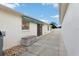 Patio with storage shed and access to backyard at 1330 Lajolla Cir, The Villages, FL 32159