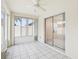 Sunroom with tile floor and access to backyard at 1330 Lajolla Cir, The Villages, FL 32159