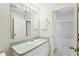 Bathroom with vanity sink and view of another room at 1330 Lajolla Cir, The Villages, FL 32159