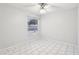 Empty bedroom with tile flooring and ceiling fan at 1330 Lajolla Cir, The Villages, FL 32159