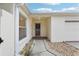 Inviting entryway with a secure front door, leading into a bright and welcoming home at 1330 Lajolla Cir, The Villages, FL 32159