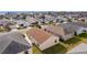 Aerial view of house and surrounding neighborhood at 1387 Zest Ave, The Villages, FL 32163