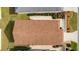 An overhead view of a single house and its backyard at 1387 Zest Ave, The Villages, FL 32163