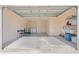 Attached garage with washer, dryer, and ample storage space at 1387 Zest Ave, The Villages, FL 32163