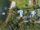 Large property with lakefront access and multiple structures at 17531 County Road 455, Montverde, FL 34756