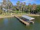 Aerial view of house, dock and boathouse at 17531 County Road 455, Montverde, FL 34756