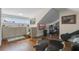 Bright bonus room features angled ceiling, wood floors and kitchenette with a view of the lake at 17531 County Road 455, Montverde, FL 34756
