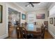 Spacious dining area with a large table and hardwood floors at 17531 County Road 455, Montverde, FL 34756
