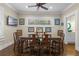 Elegant dining room with dark hardwood floors and picturesque window view at 17531 County Road 455, Montverde, FL 34756