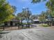 Gravel driveway leading to the farm with horse stables visible at 17531 County Road 455, Montverde, FL 34756