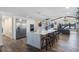 Open concept kitchen with island, stainless steel appliances, and white cabinets at 17531 County Road 455, Montverde, FL 34756
