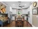 Well-equipped kitchen boasts white cabinets, stainless steel appliances, and an island at 17531 County Road 455, Montverde, FL 34756