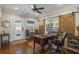 Home office featuring wood floors and a spacious work area at 17531 County Road 455, Montverde, FL 34756