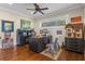 Home office with a dark wood desk and metal chairs at 17531 County Road 455, Montverde, FL 34756