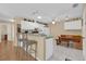 Eat-in kitchen with breakfast nook and light wood flooring at 202 Estrada Pl, The Villages, FL 32159