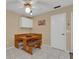 Charming built-in wooden breakfast nook in this cozy kitchen at 202 Estrada Pl, The Villages, FL 32159