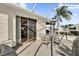 Screened patio with table and chairs, ideal for outdoor dining at 202 Estrada Pl, The Villages, FL 32159