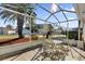 Relaxing screened patio overlooking the community at 202 Estrada Pl, The Villages, FL 32159
