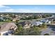 Aerial view of neighborhood homes and landscaping at 2131 Baldwin Run, The Villages, FL 32162