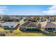 Aerial view showcasing home's backyard and neighborhood at 2131 Baldwin Run, The Villages, FL 32162