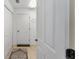 Laundry room with washer, dryer, and storage at 2131 Baldwin Run, The Villages, FL 32162