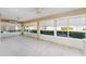 Bright and airy sunroom with multiple windows at 2131 Baldwin Run, The Villages, FL 32162