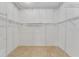Spacious walk-in closet with wire shelving at 2131 Baldwin Run, The Villages, FL 32162