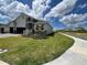 Charming single-Gathering home with a well-maintained lawn and a two-car garage at 2137 Sunshine Peak Dr, Minneola, FL 34715