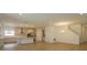 Open concept kitchen with island and stainless steel appliances at 2137 Sunshine Peak Dr, Minneola, FL 34715