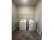 Laundry room with washer and dryer hookups at 2173 Sunshine Peak Dr, Minneola, FL 34715