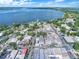 Aerial view of the town, showcasing waterfront, homes, and businesses at 221 S Johns St, Mount Dora, FL 32757